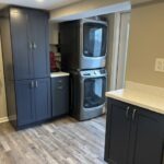 Wildwood kitchen remodel with Fabuwood Galaxy Indigo cabinets and HiMacs White Quartz countertops